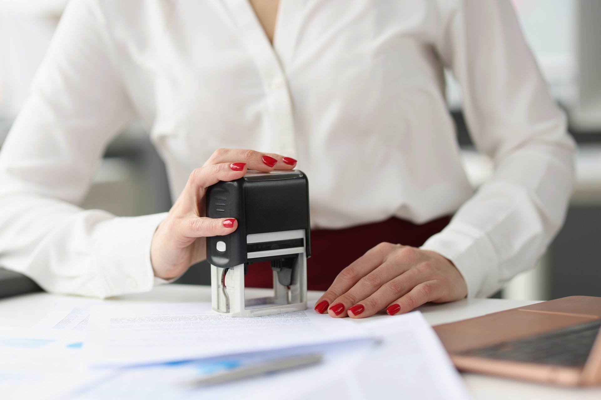 Professional notary stamping documents
