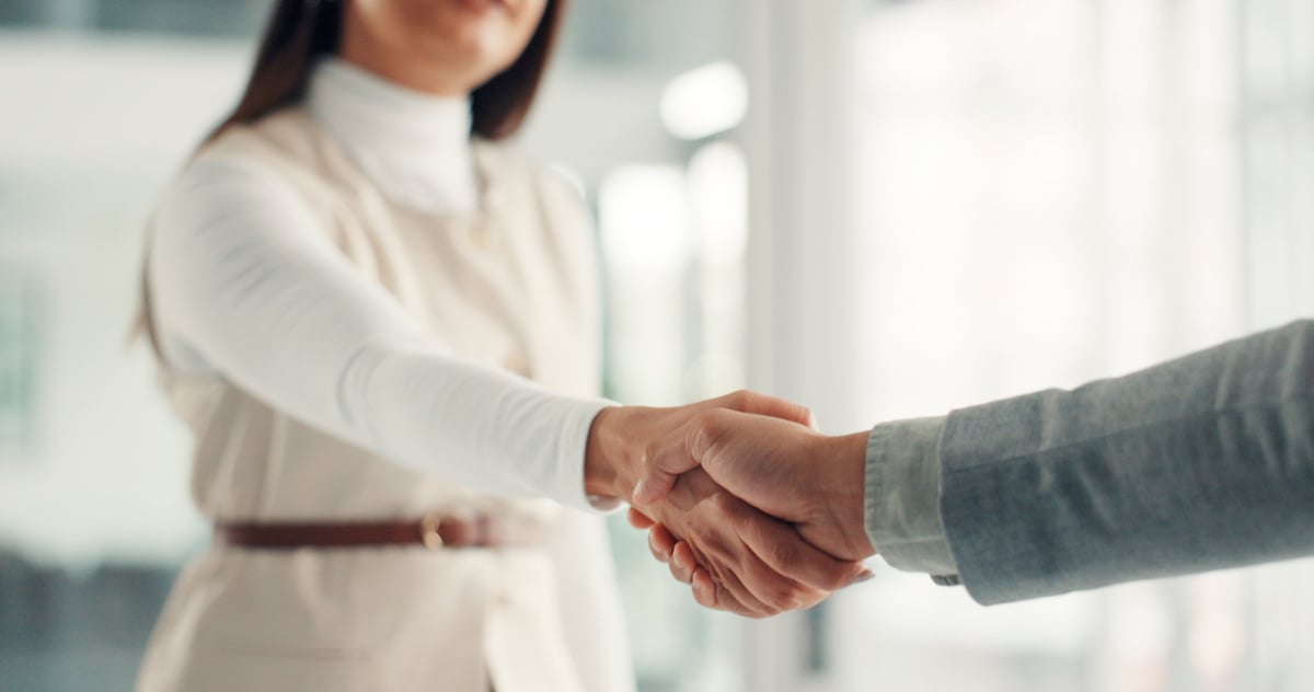 Business professionals closing a deal